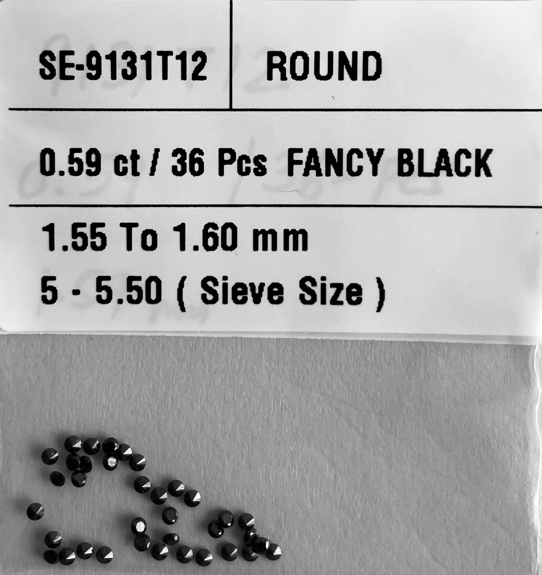 0.59 Carat Natural Fancy Black Round Diamond SE-9131T12