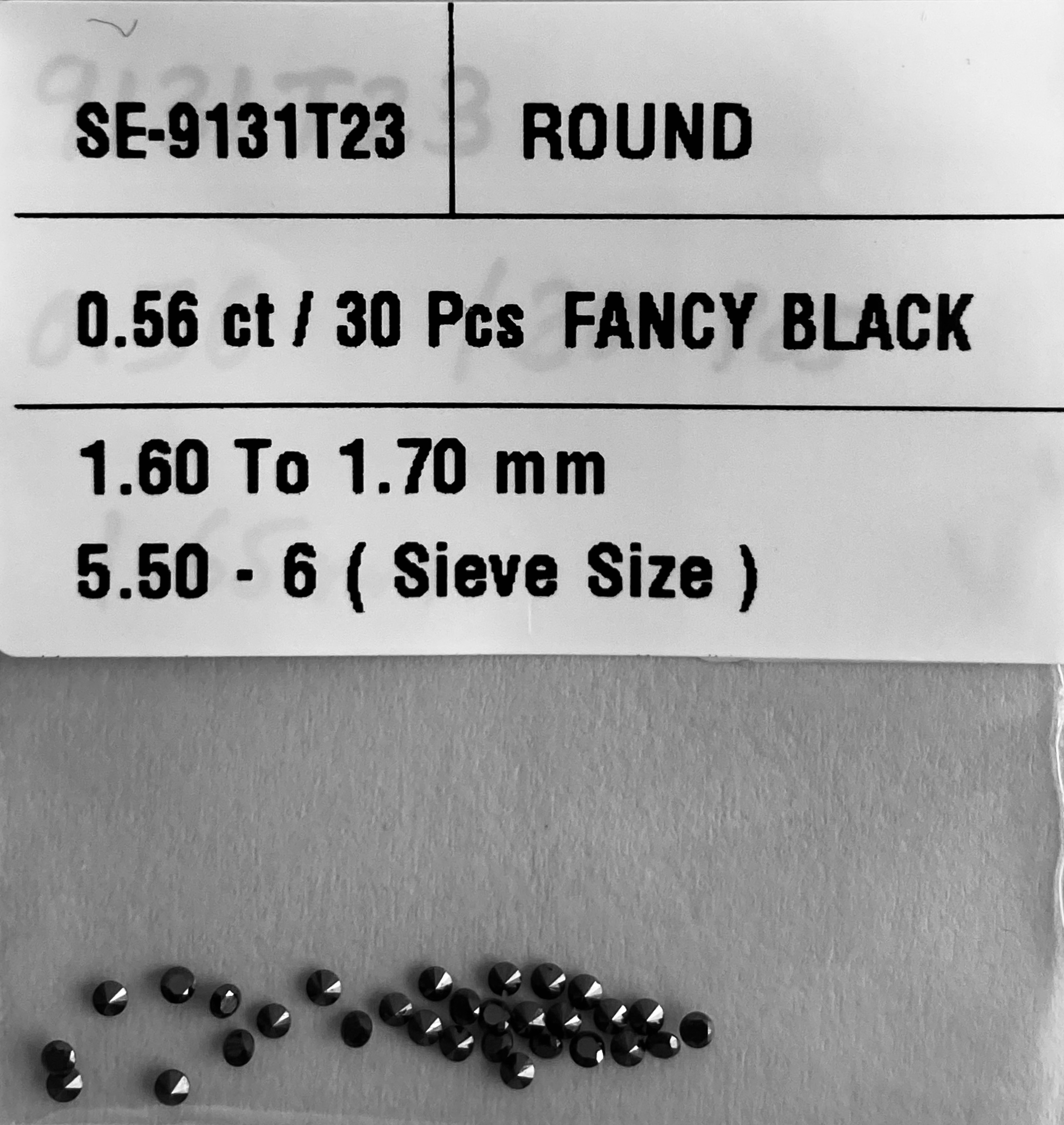 0.56 Carat Natural Fancy Black Round Diamond SE-9131T23